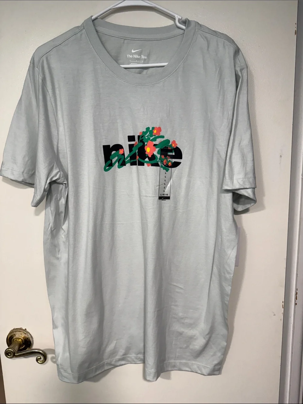 Nike Men’s Light Gray Logo Tee with Floral Accent